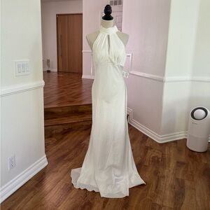 White satin halter big back bow white gown.